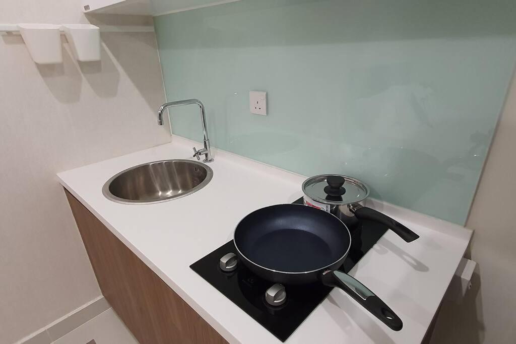 Kozi Square New Sgh Cozy Home 7A Kuching Bagian luar foto